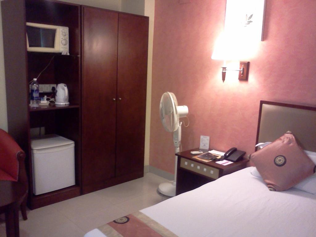 Landmark Hotel Calcutta Værelse billede
